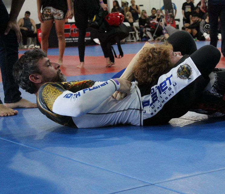 Students training no-gi Brazilian Jiu-Jitsu at 10th Planet Beaumont, a martial arts academy in Beaumont, Texas