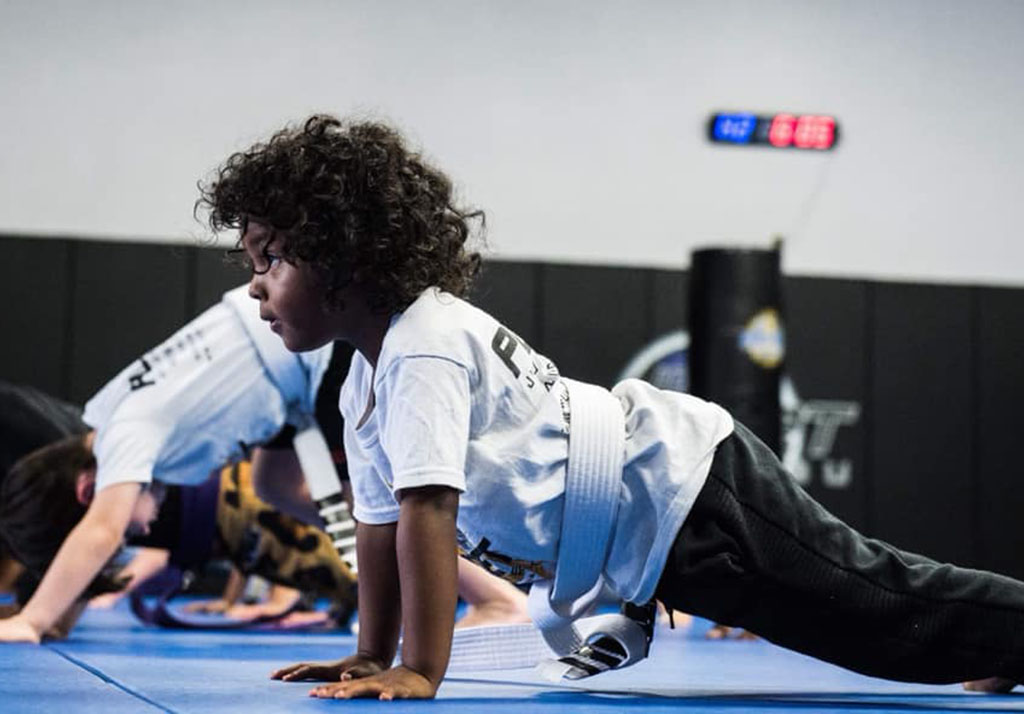Young children in a Little Dragons martial arts class at 10th Planet Beaumont