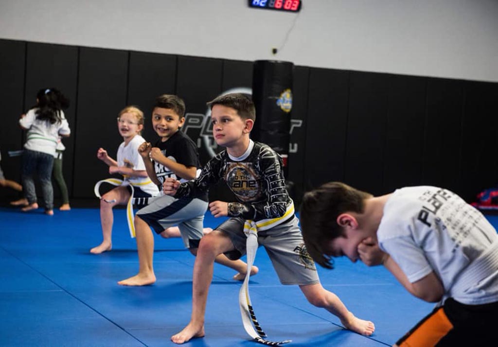 Little Dragons students having fun in a martial arts class at 10th Planet Beaumont