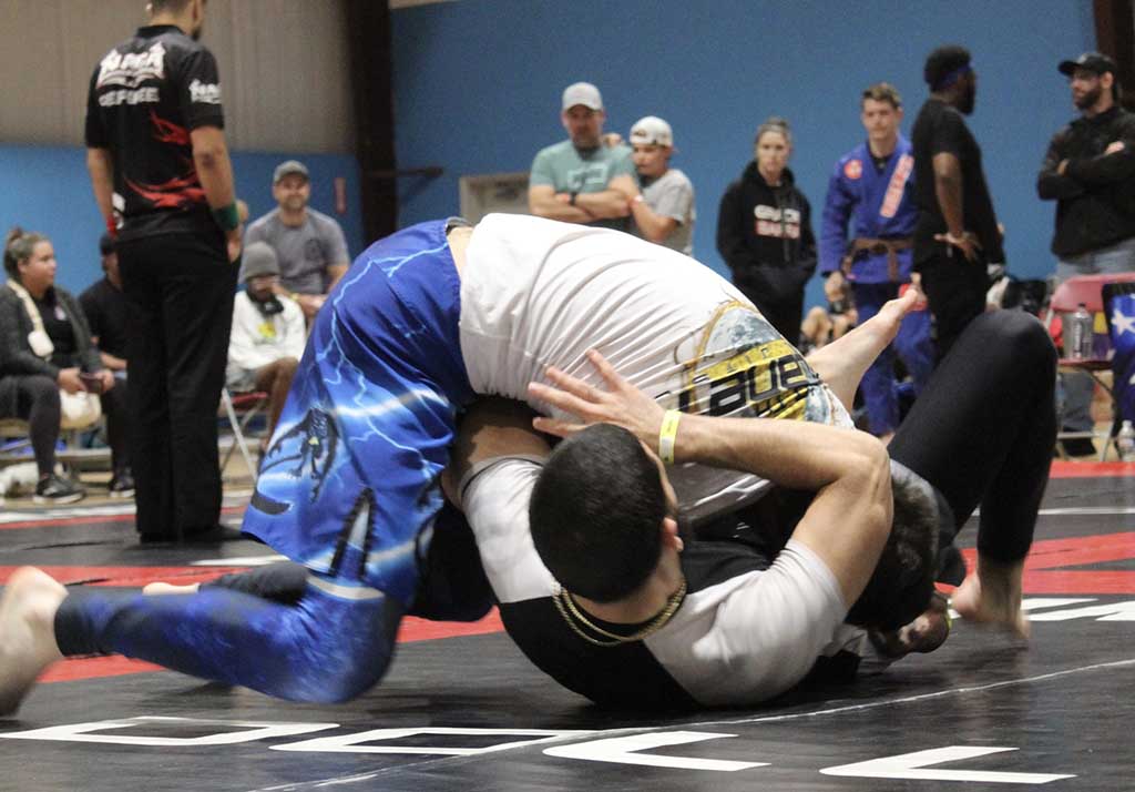 10th Planet Beaumont student winning with side control at competition