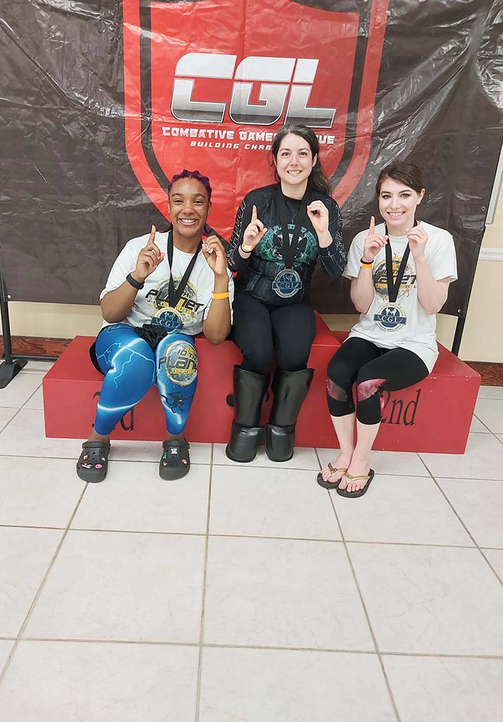 Female 10th Planet Beaumont student winning at competition