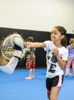 Young children in a Little Dragons martial arts class at 10th Planet Beaumont