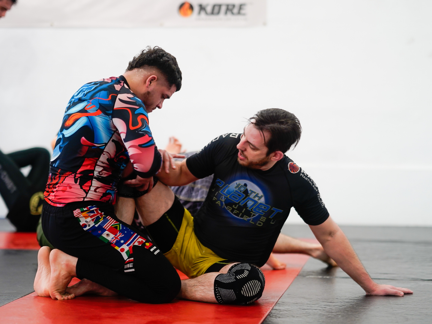 Adult martial arts class training on the mats at Radius Martial Arts Academy in Fairfield, CT
