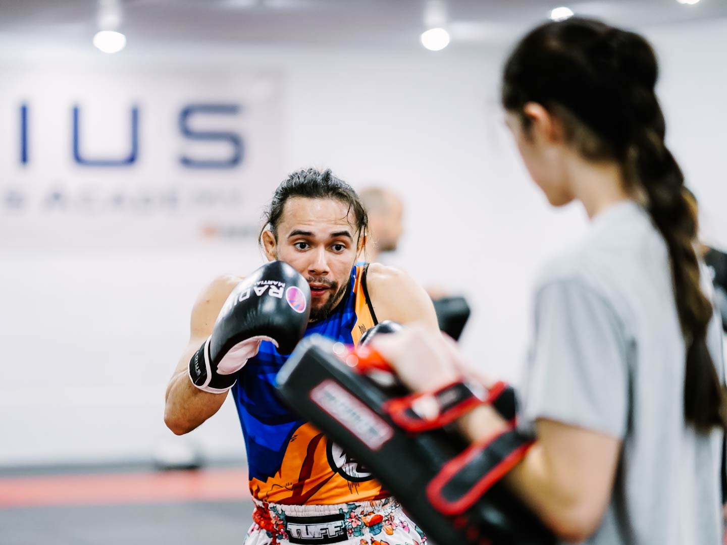Adult Muay Thai kickboxing class at Radius Martial Arts Academy in Fairfield, CT